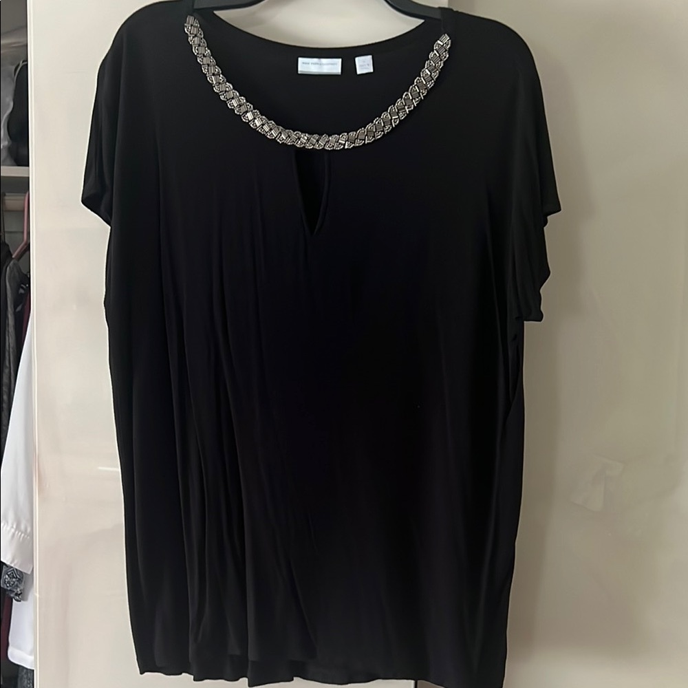 Elegant Black Top with Silver Accents